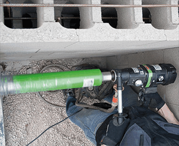 END 130 Core Drill in use coring a hole