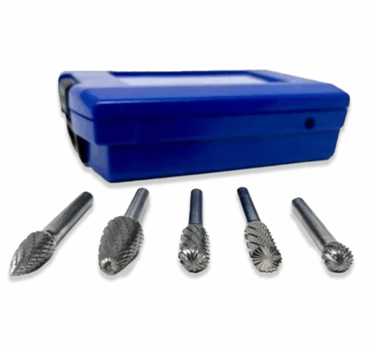 Five carbide rotary burr bits arranged in front of a closed blue storage case on a white background.