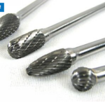 Four carbide rotary burr bits with textured cutting heads, shown close together on a white surface with a Sale label.